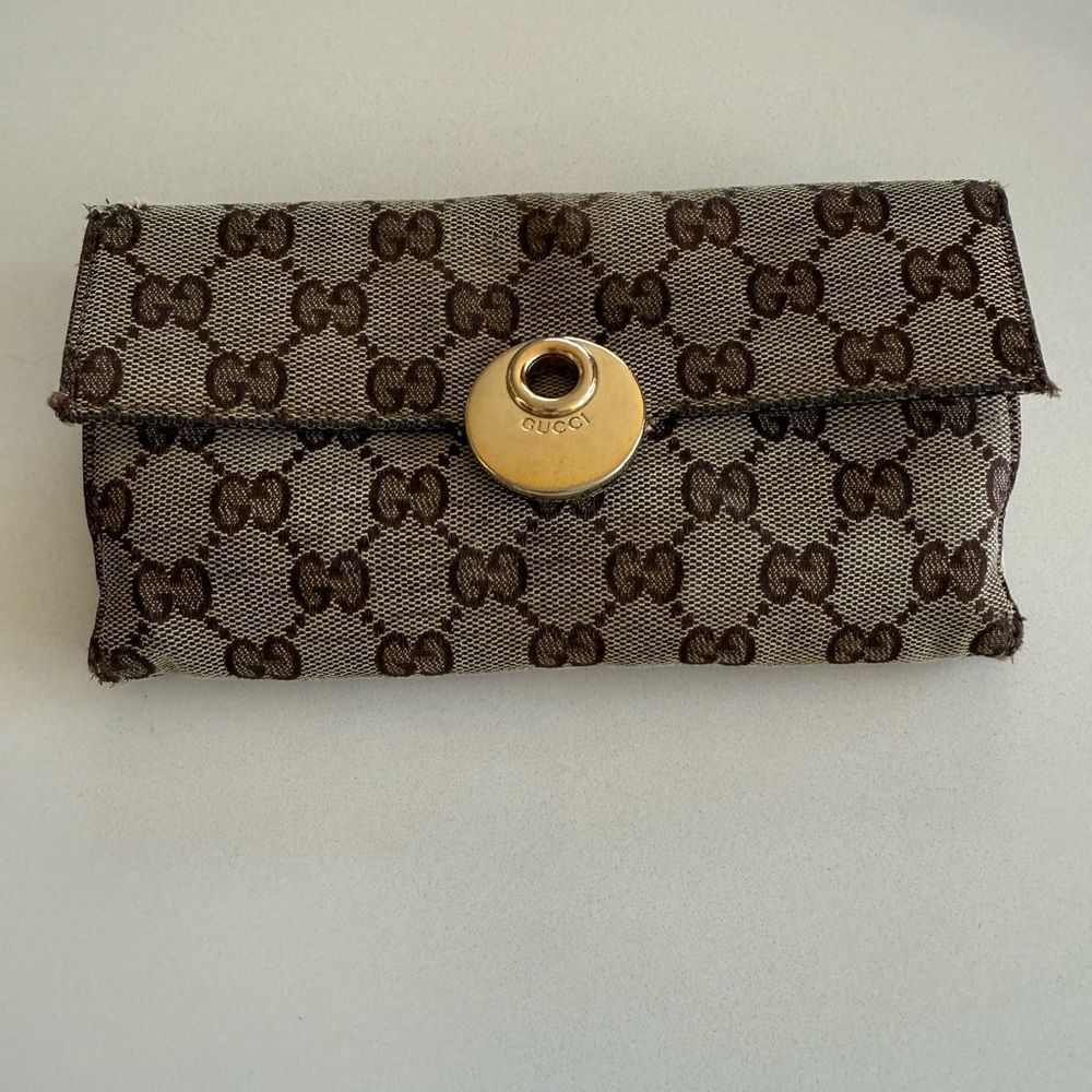 Gucci Brown Monogram Wristlet with Gold Accent